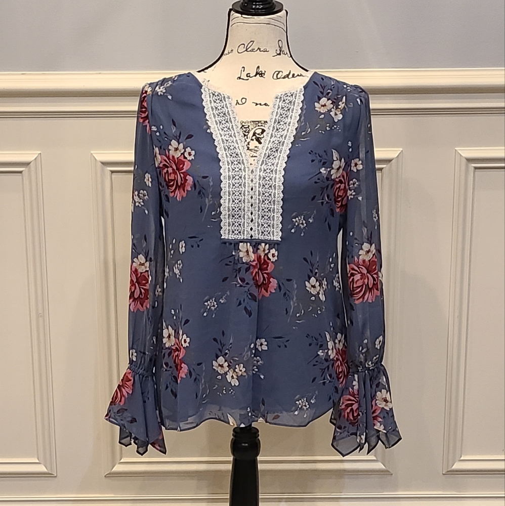 Blue floral print blouse by: White House Black Market(used)